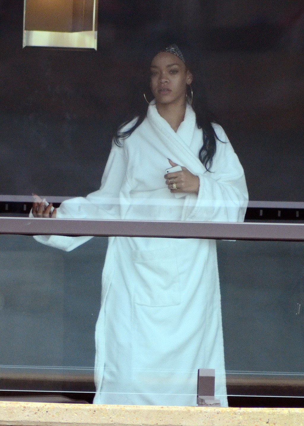 Rihanna showing big cleavage  long legs in wide open topcoat out in Sydney and a #75266862