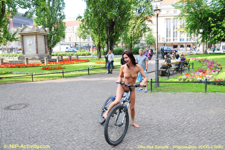 Naked bicycling girl #70778361
