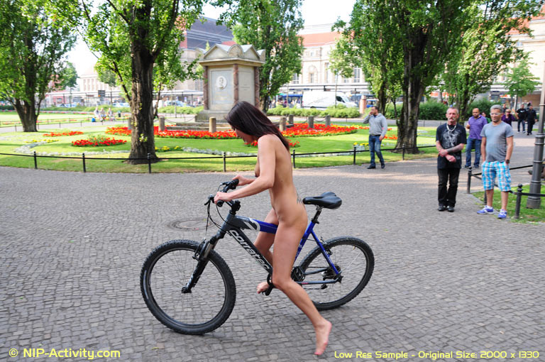 Naked bicycling girl #70778369
