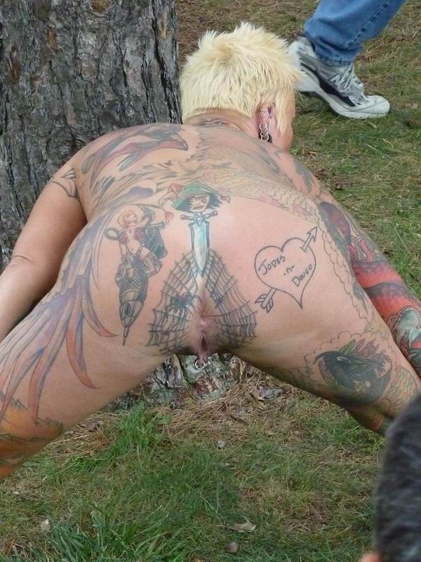 Extreme tattoo and piercing #73231378