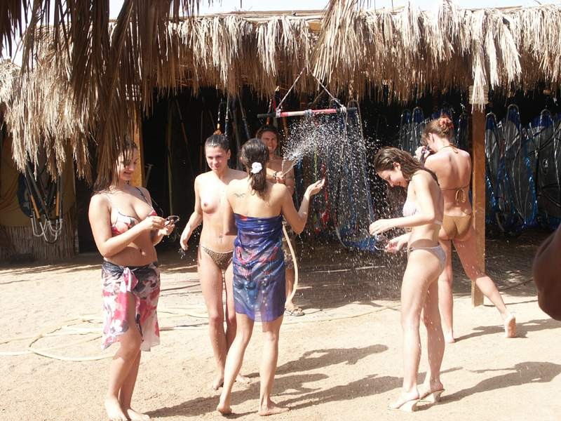 Sexy milf bares all at a nudist seaside in the sunlight #72250899