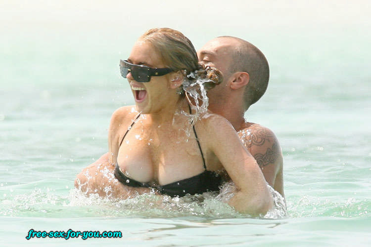 Lindsay Lohan nipple slip and bikini beach paparazzi pictures #75435062