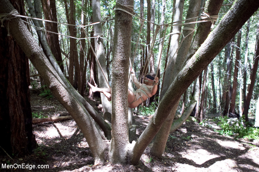 Straight stud Logan Vaughn is captured in the deep woods and edged for days. #72024523