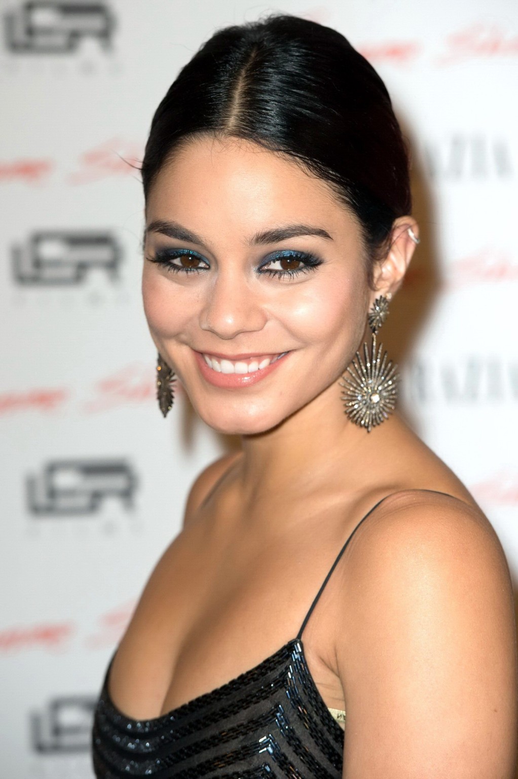 Vanessa Hudgens braless wearing a low cut maxi dress at Gimme Shelter premiere i #75182595
