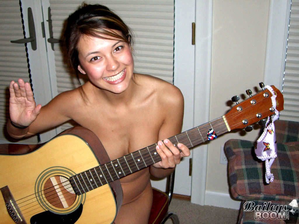 Guitar playing teen peels off her hot little thong #78677190