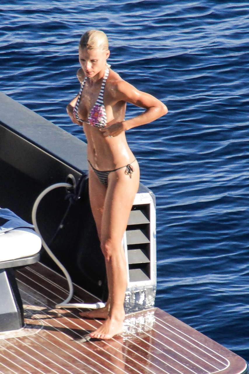 Michelle Hunziker showing her great ass in bikini thong paparazzi pictures #75252448