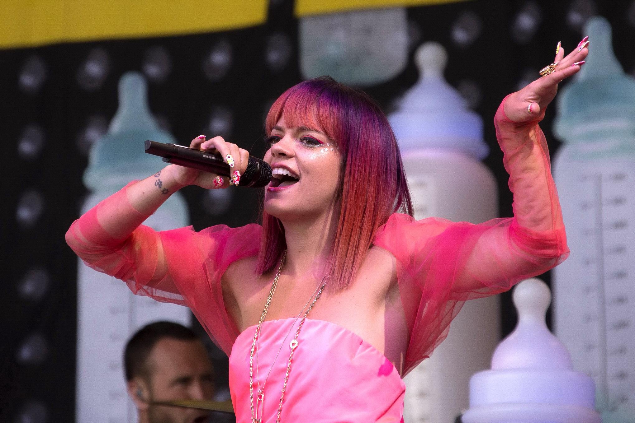 Lily Allen flashing her pink panties on stage at the Glastonbury Festival #75192496