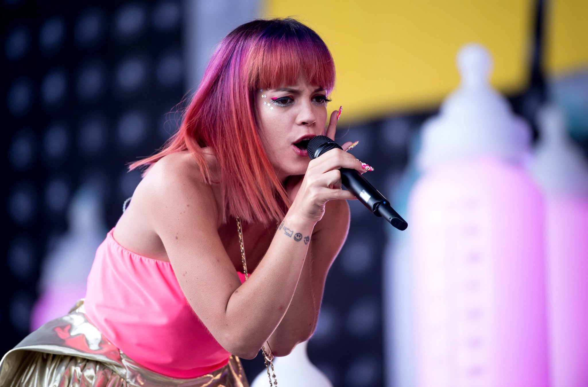 Lily Allen flashing her pink panties on stage at the Glastonbury Festival #75192514