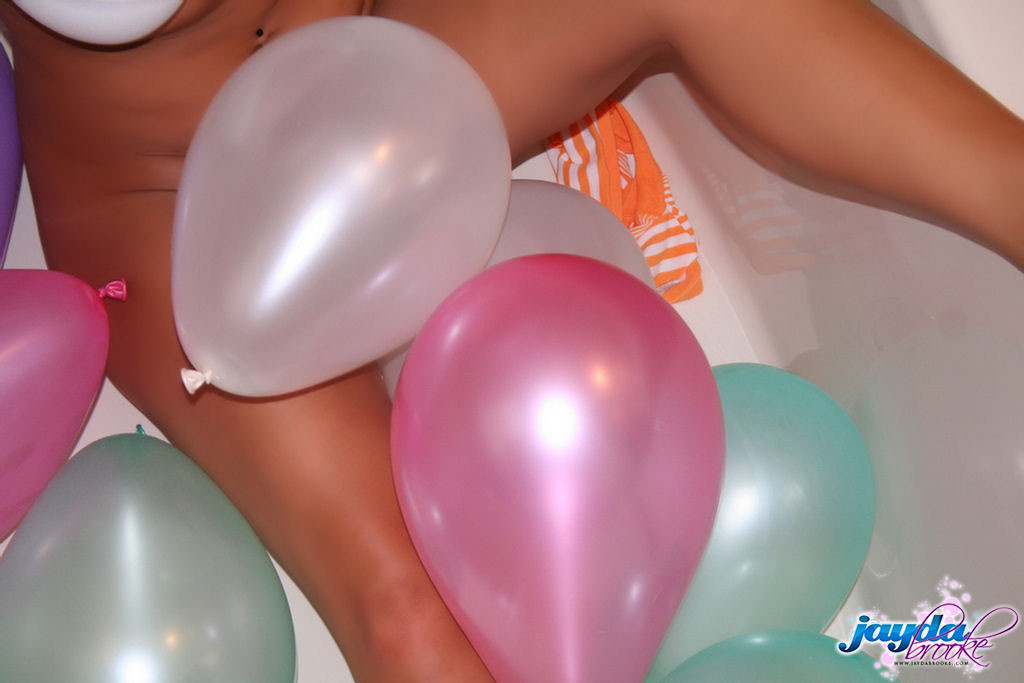 Jayda Brook bouncing on a balloon #78673857