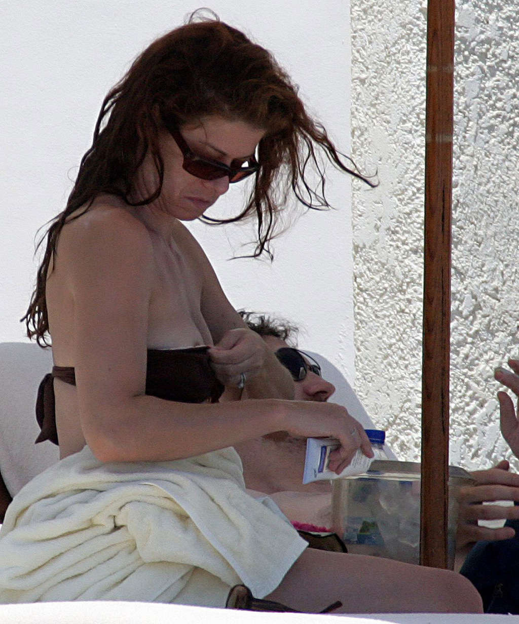 Debra Messing nipple slip on beach paparazzi pictures and posing nude #75372293