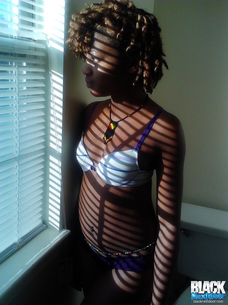 Black teen with small tits posing in the sun lights #67188489