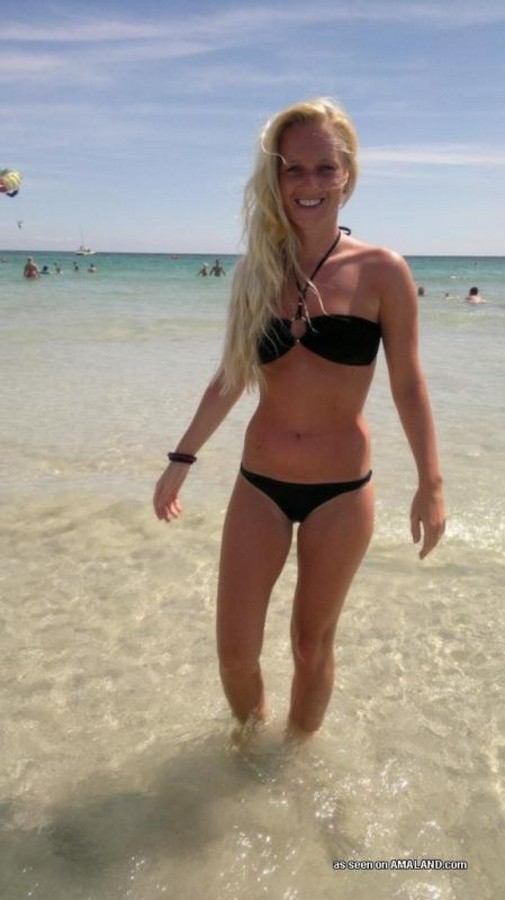 Photos of a sexy blonde babe posing in her black bikini #67228770