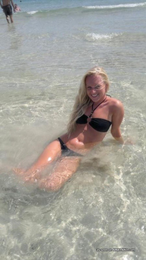 Photos of a sexy blonde babe posing in her black bikini #67228774