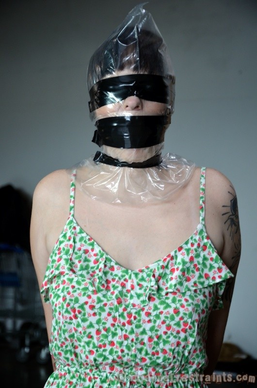 Gagged, blindfolded, with her hands tied behind her back, Madisin Moon waits fo #72012439