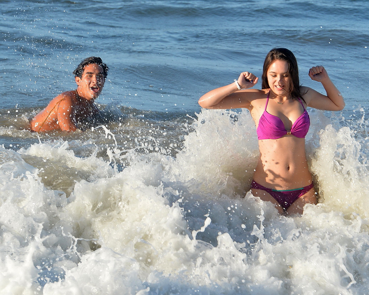 Hayley Orrantia shows off her hot body in a skimpy pink bikini at the beach in L #75189326