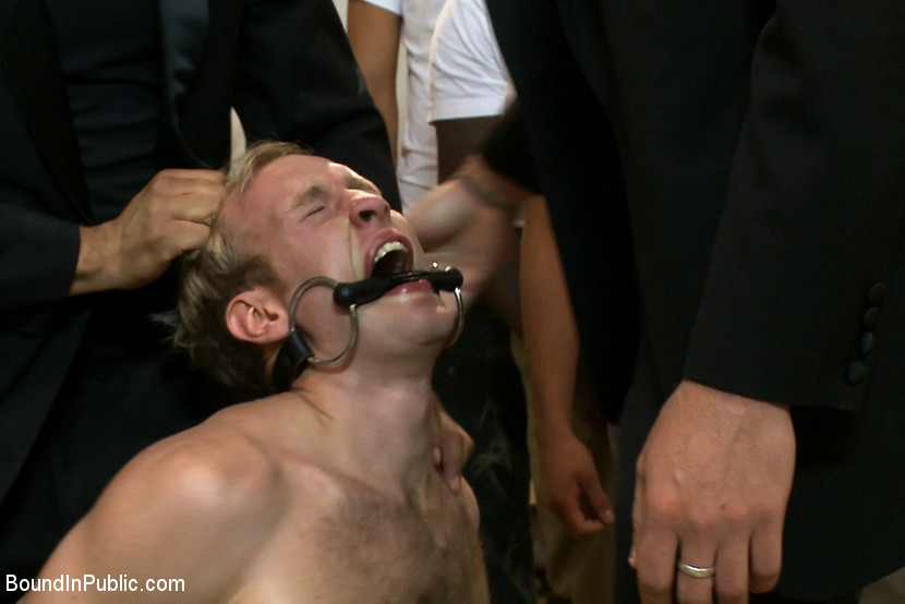 A studly blond straight dude gets tied up and used by a horny gay crowd. #76937221