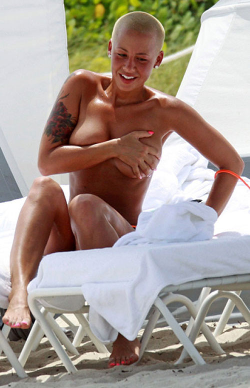 Amber Rose exposing her nice and big tits and great ass in thong paparazzi pictu #75382676