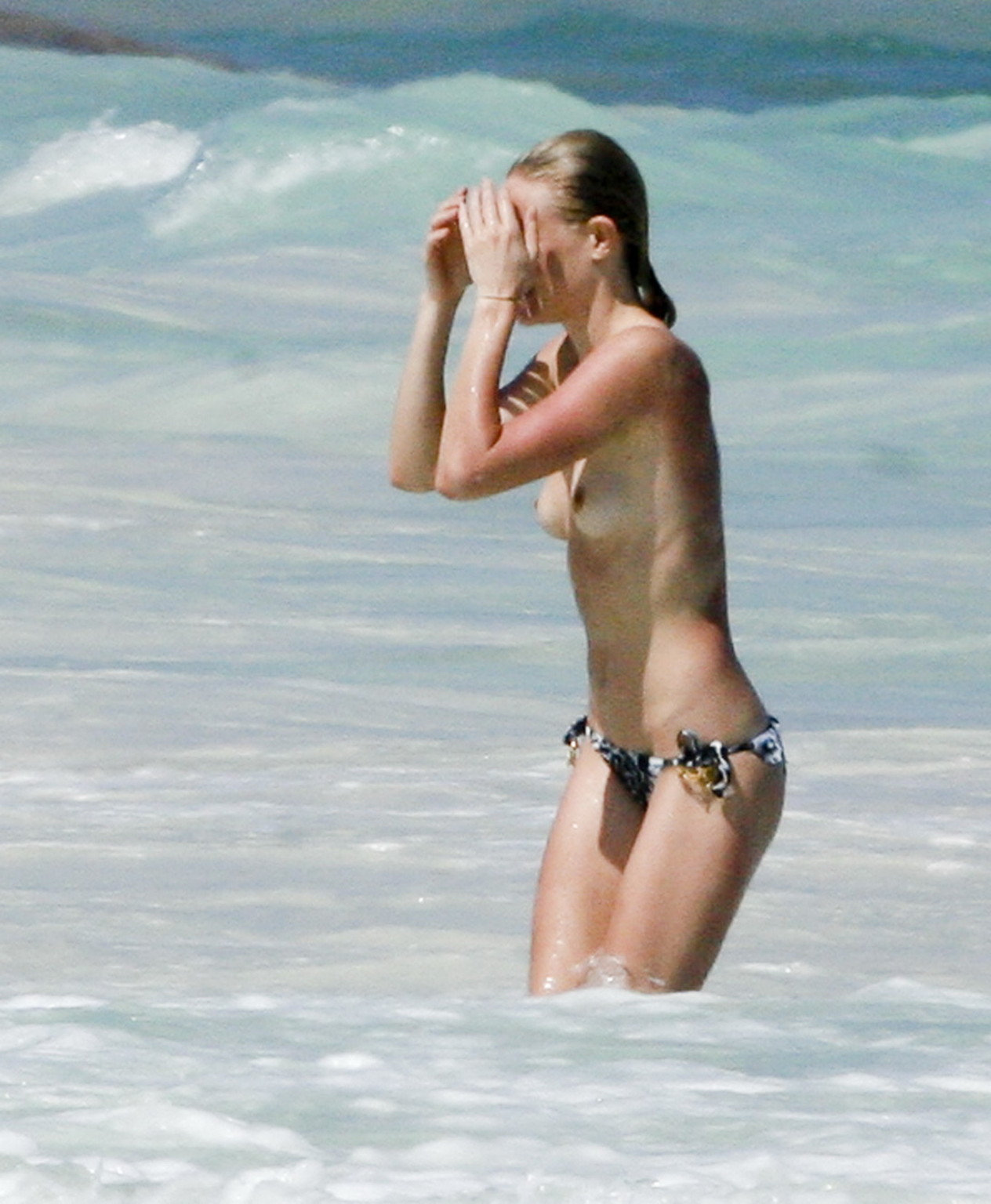Kate Bosworth topless on the beach in Cancun Mexico #75308613