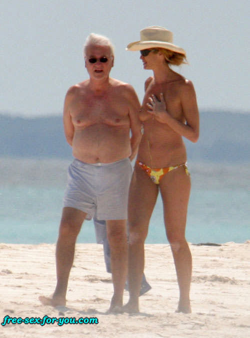 Elle MacPherson showing her nice tits on beach paparazzi pics #75424381