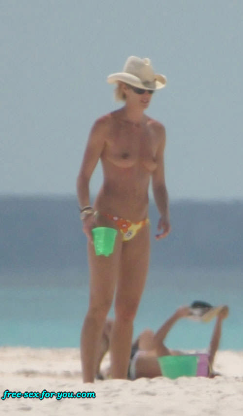 Elle MacPherson showing her nice tits on beach paparazzi pics #75424390