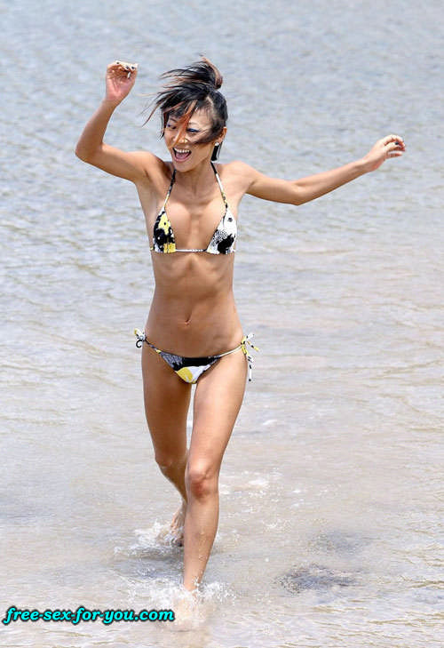 Bai Ling showing her pussy and small tits to paparazzi on beach #75419437