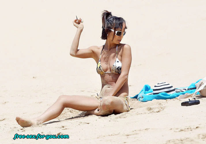 Bai Ling showing her pussy and small tits to paparazzi on beach #75419475