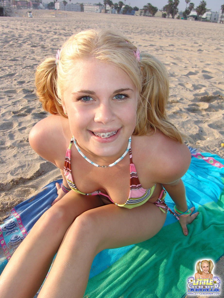 teen little summer flashing on the beach #78869169