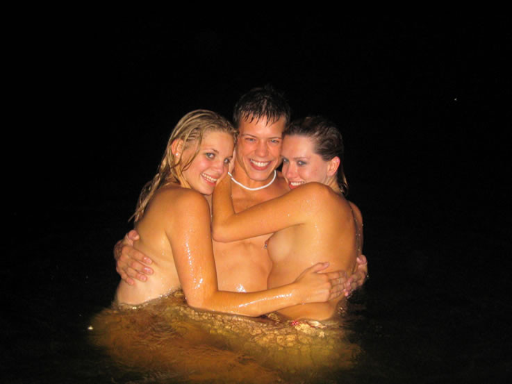 Teens going skinny dipping after college party #78927420