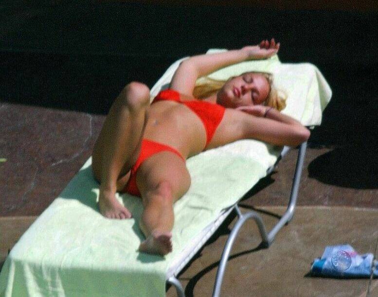 sexy Pop Star Britney Spears Stretching In A Red Thong Bikini