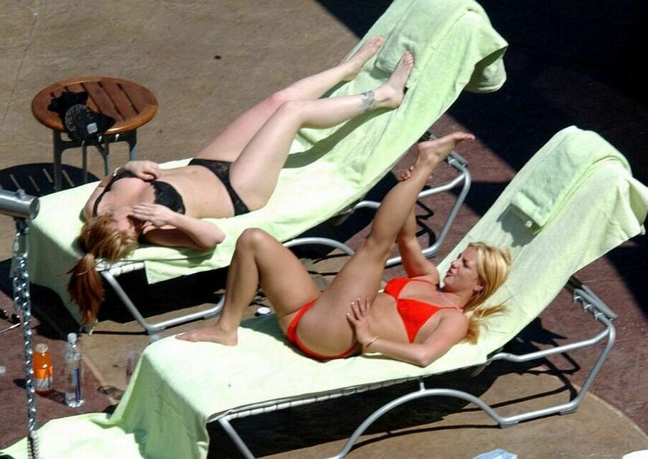 sexy pop star Britney Spears stretching in a red thong bikini #75368802