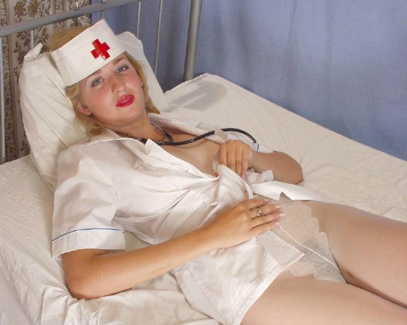 Amateur nurse in bed stuffing her hairy twat with a dildo #77317480