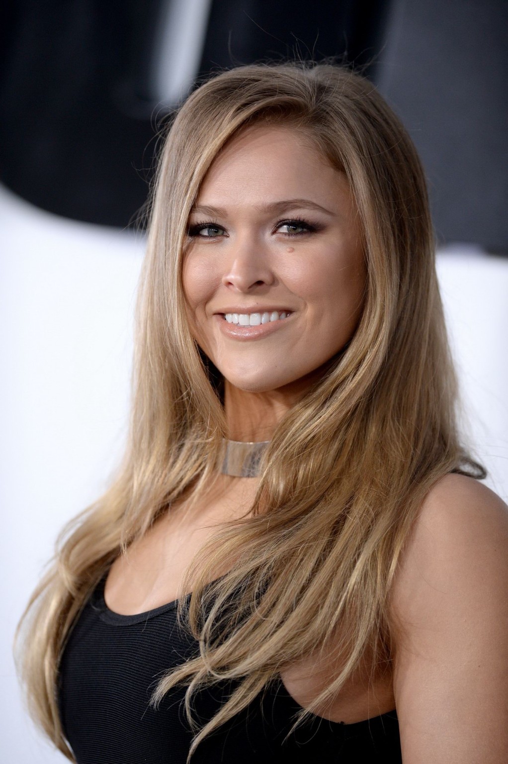 Ronda Rousey busty wearing tight black dress at the Furious 7 premiere in Hollyw #75168336
