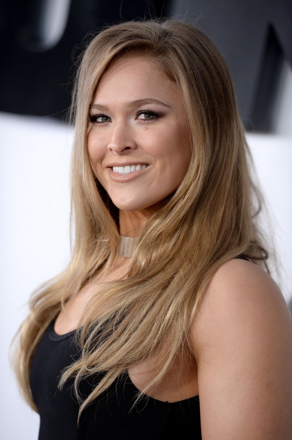 Ronda Rousey busty wearing tight black dress at the Furious 7 premiere in Hollyw #75168340