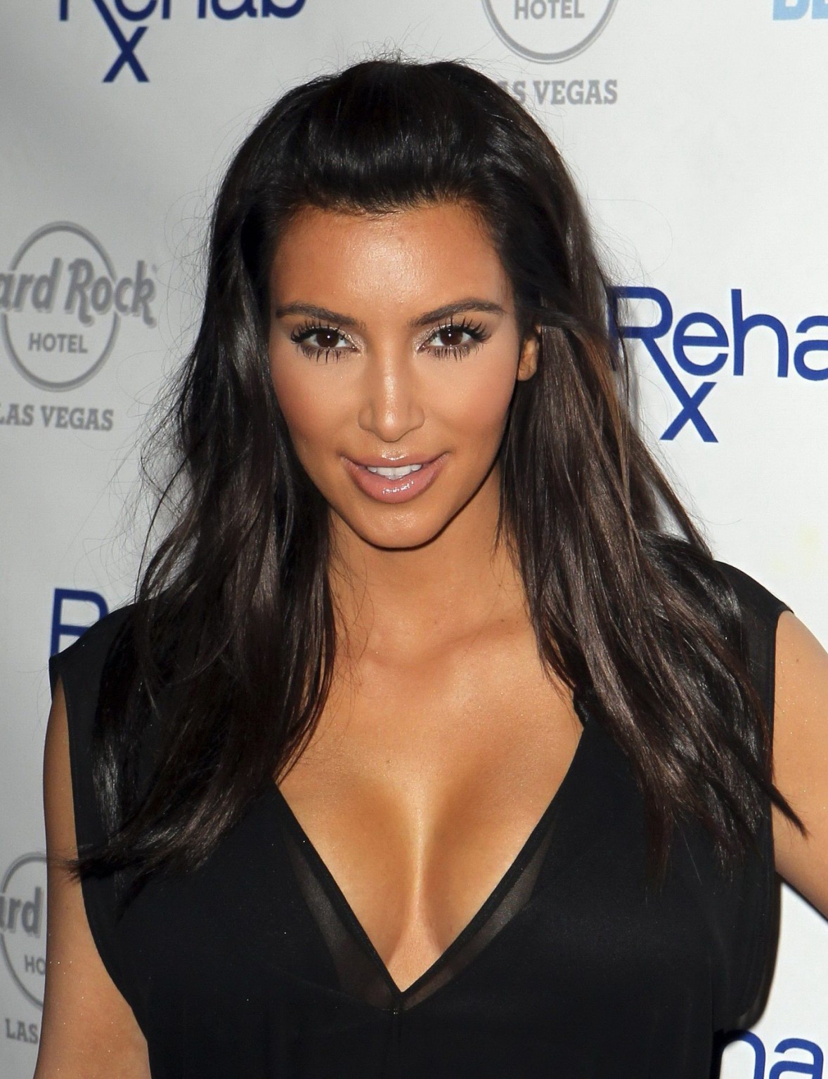 Kim Kardashian busty in black dress hosting a Rehab Sundays Pool Party at the Ha #75261369