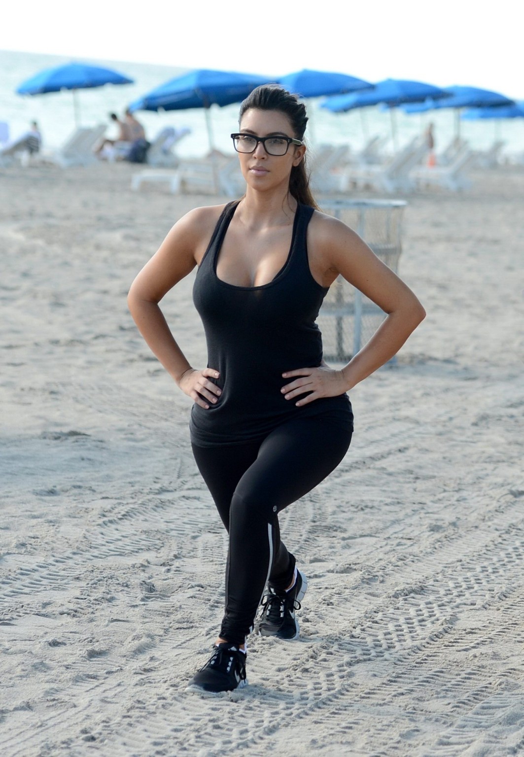 Kim Kardashian showing her sweaty cleavage  booty after a morning workout on a b #75251172