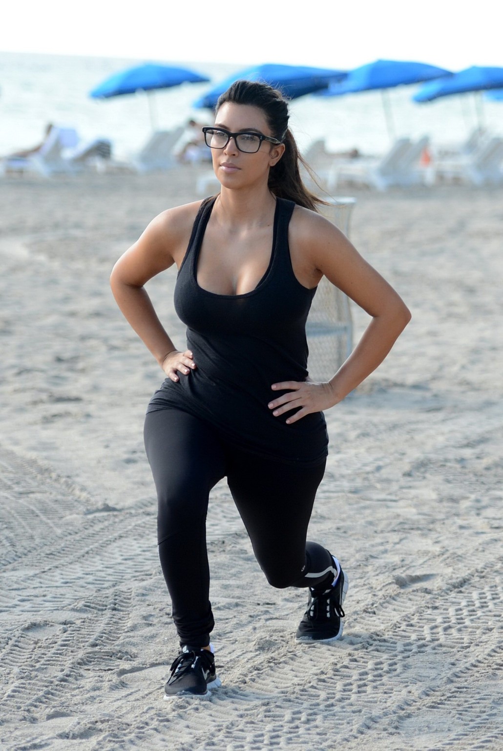 Kim Kardashian showing her sweaty cleavage  booty after a morning workout on a b #75251176