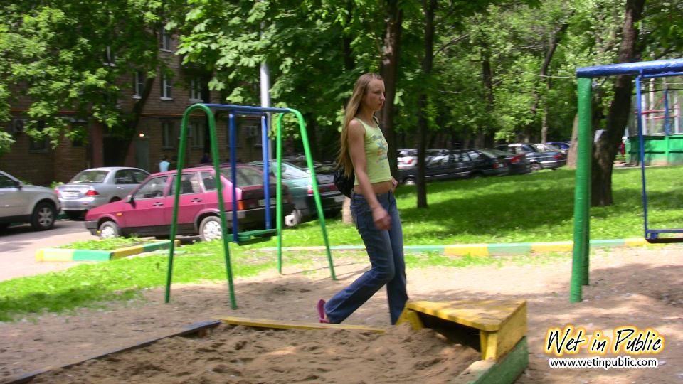 Cutie finds no better place to wet her pants than this quiet playground #73238959