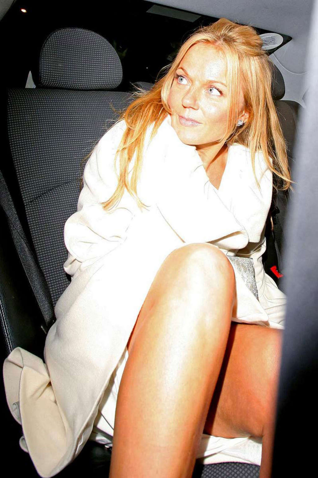 Geri Halliwell exposing her nice big tits and almost upskirt in car #75360164