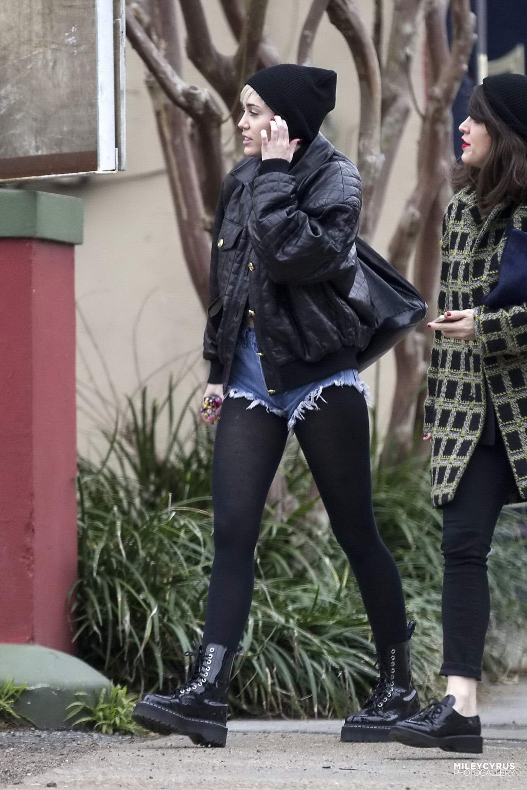 Miley Cyrus shows off her legs and ass wearing the denim shorts  black pantyhose #75201666