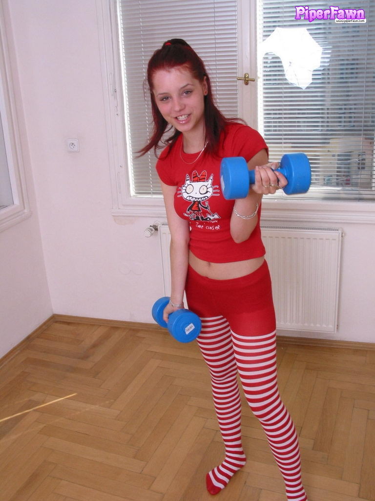 Busty redhead teen working out #78975894