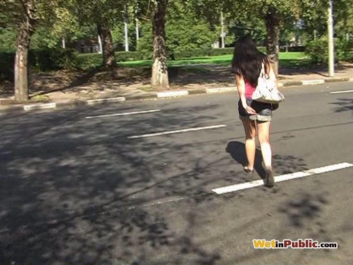 Brunette pee-wets her jean skirt and gets rid of her panties in public #78595846