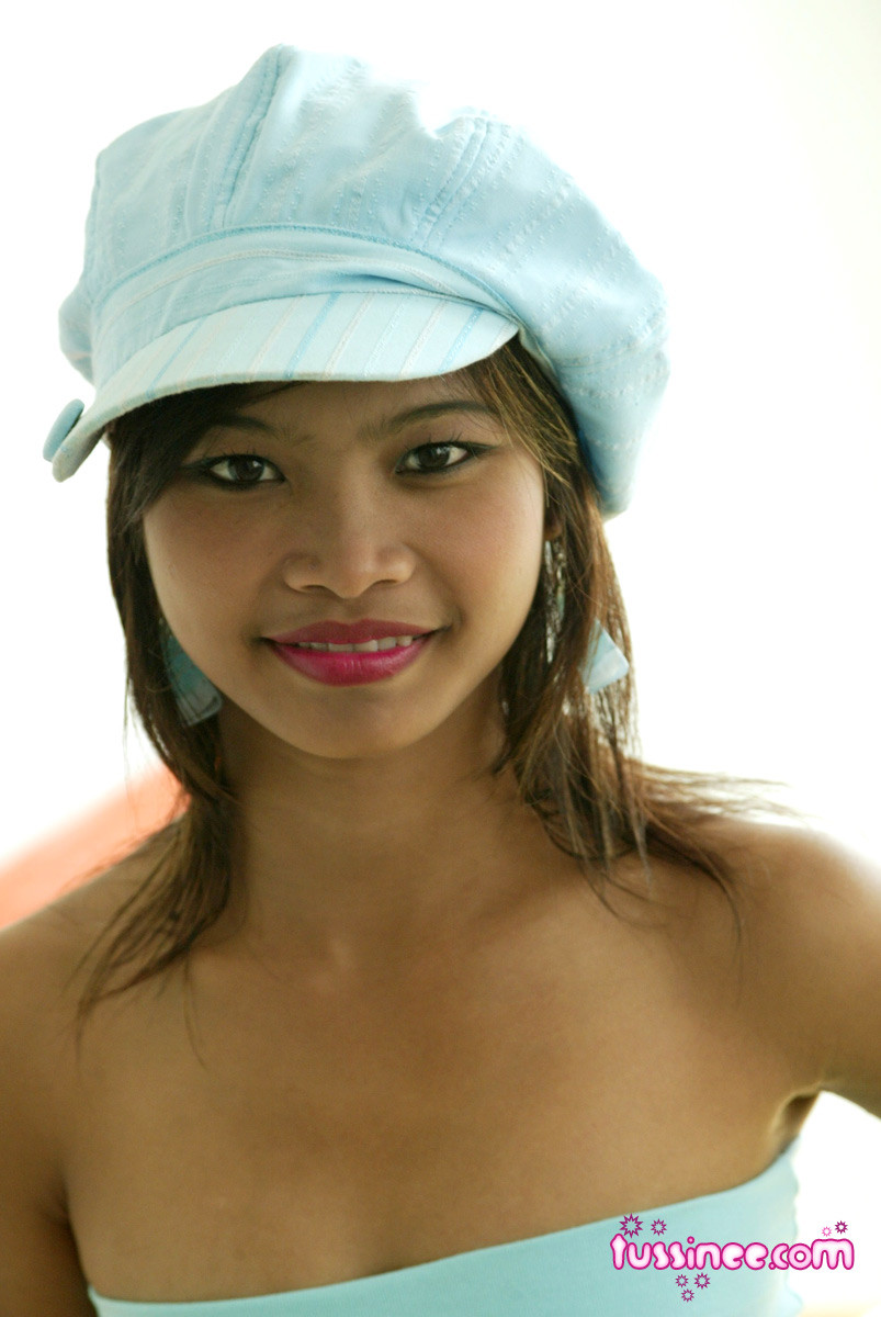 Thai teen girl wears hat #69754402