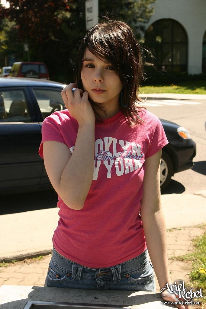 Cute teen model poses in street #67691385