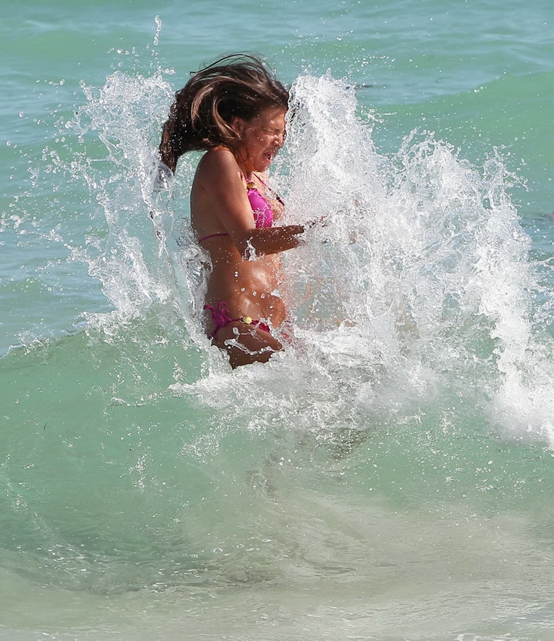 Claudia Galanti wearing skimpy pink bikini on a beach in Miami #75277585