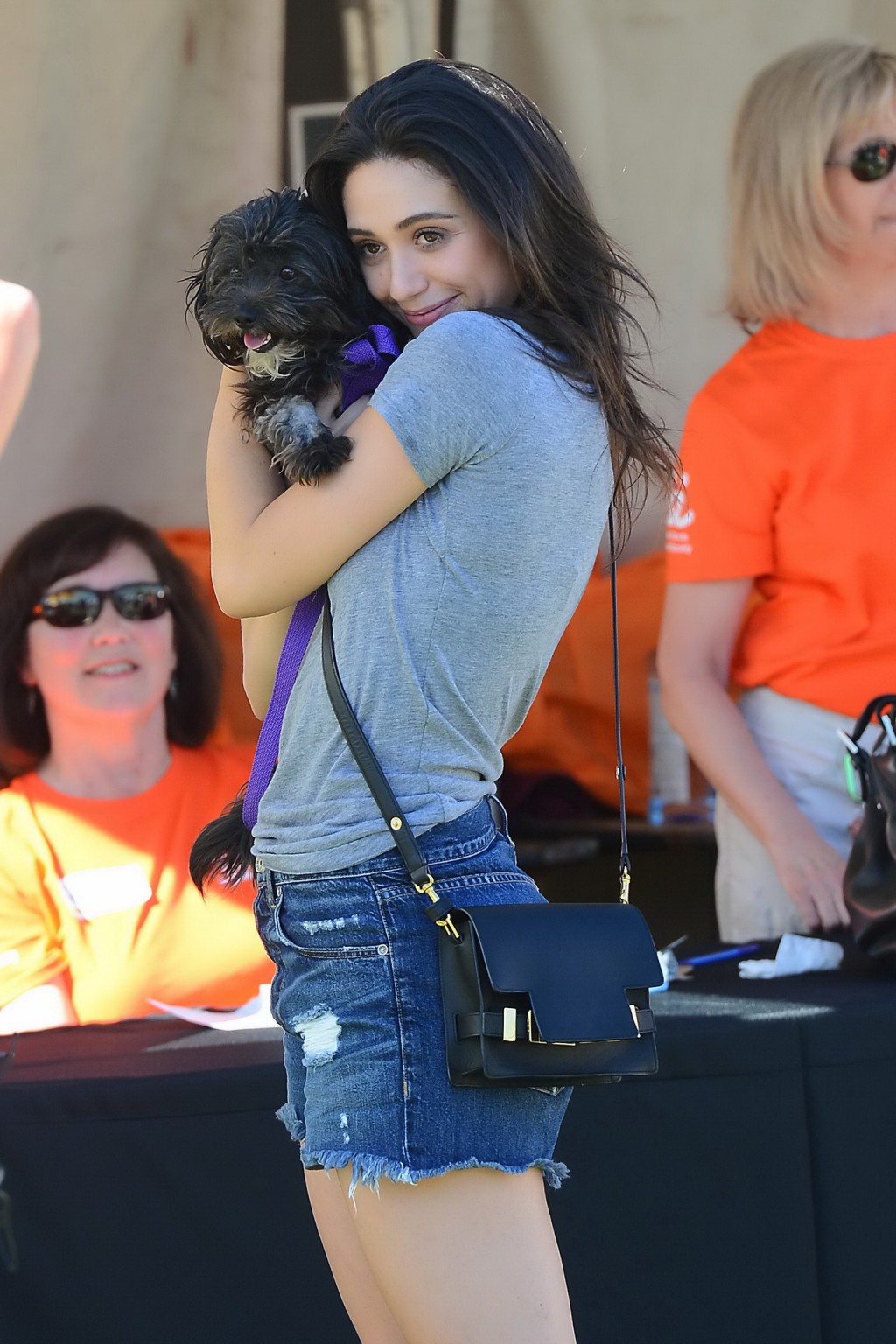 Emmy Rossum busty and leggy wearing denim shorts and top at the NKLA Adoption Ev #75181180