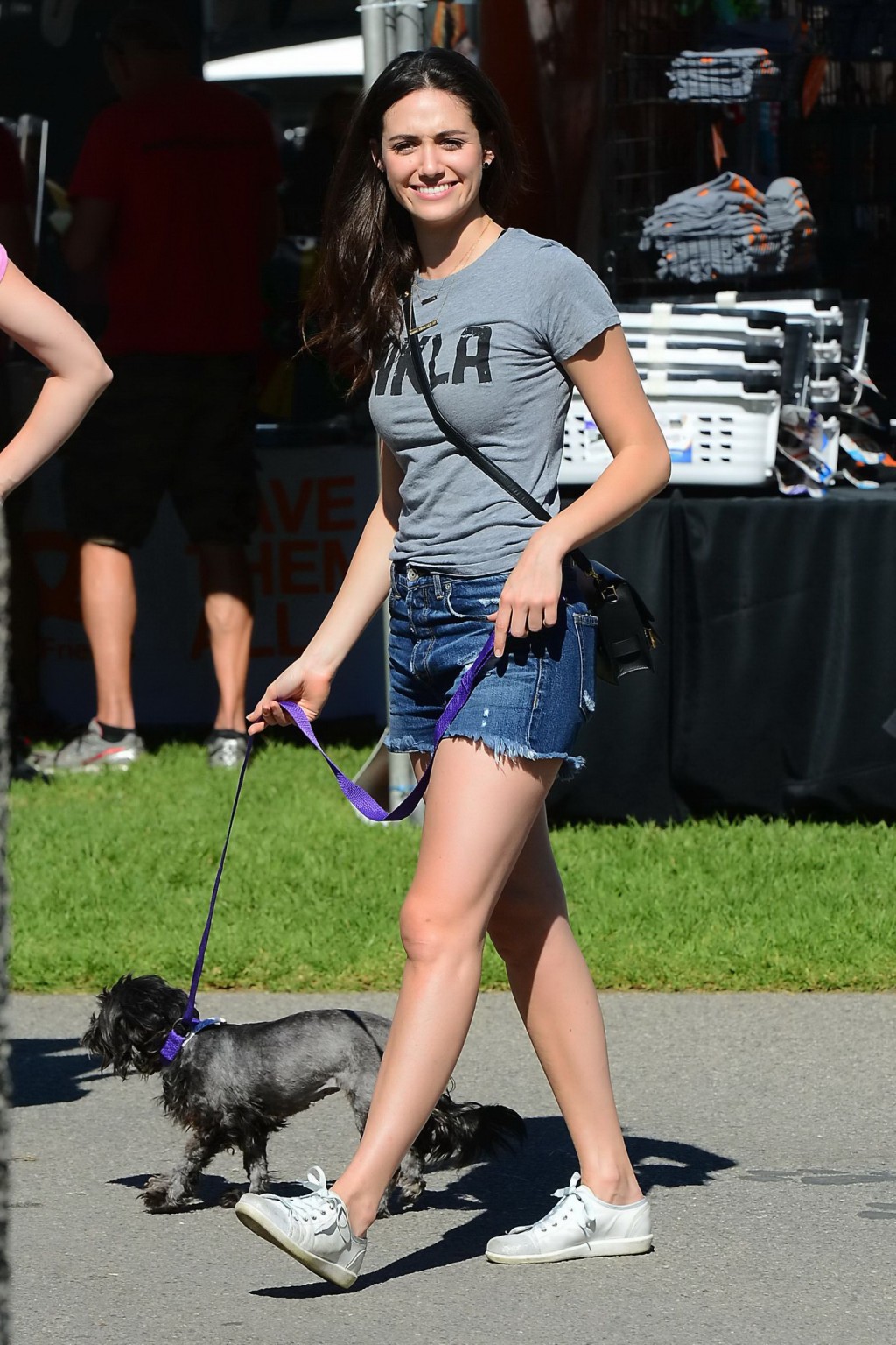 Emmy Rossum busty and leggy wearing denim shorts and top at the NKLA Adoption Ev #75181294