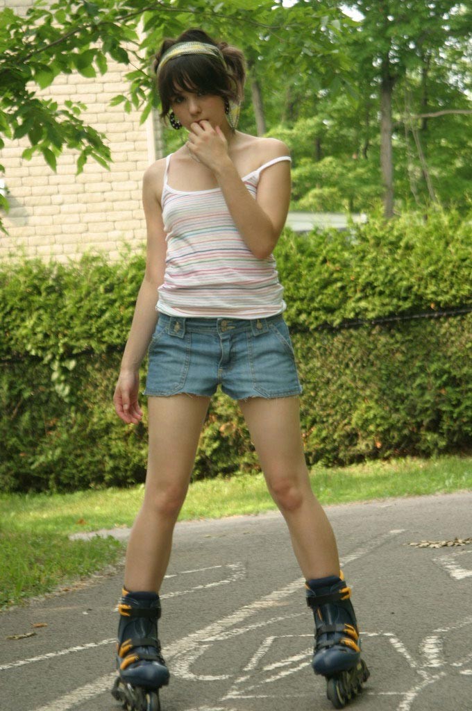 Sexy teen in rollerblades #67591092