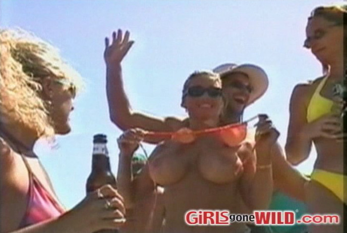 Drunk party girls outside take off their bikini tops #73206259