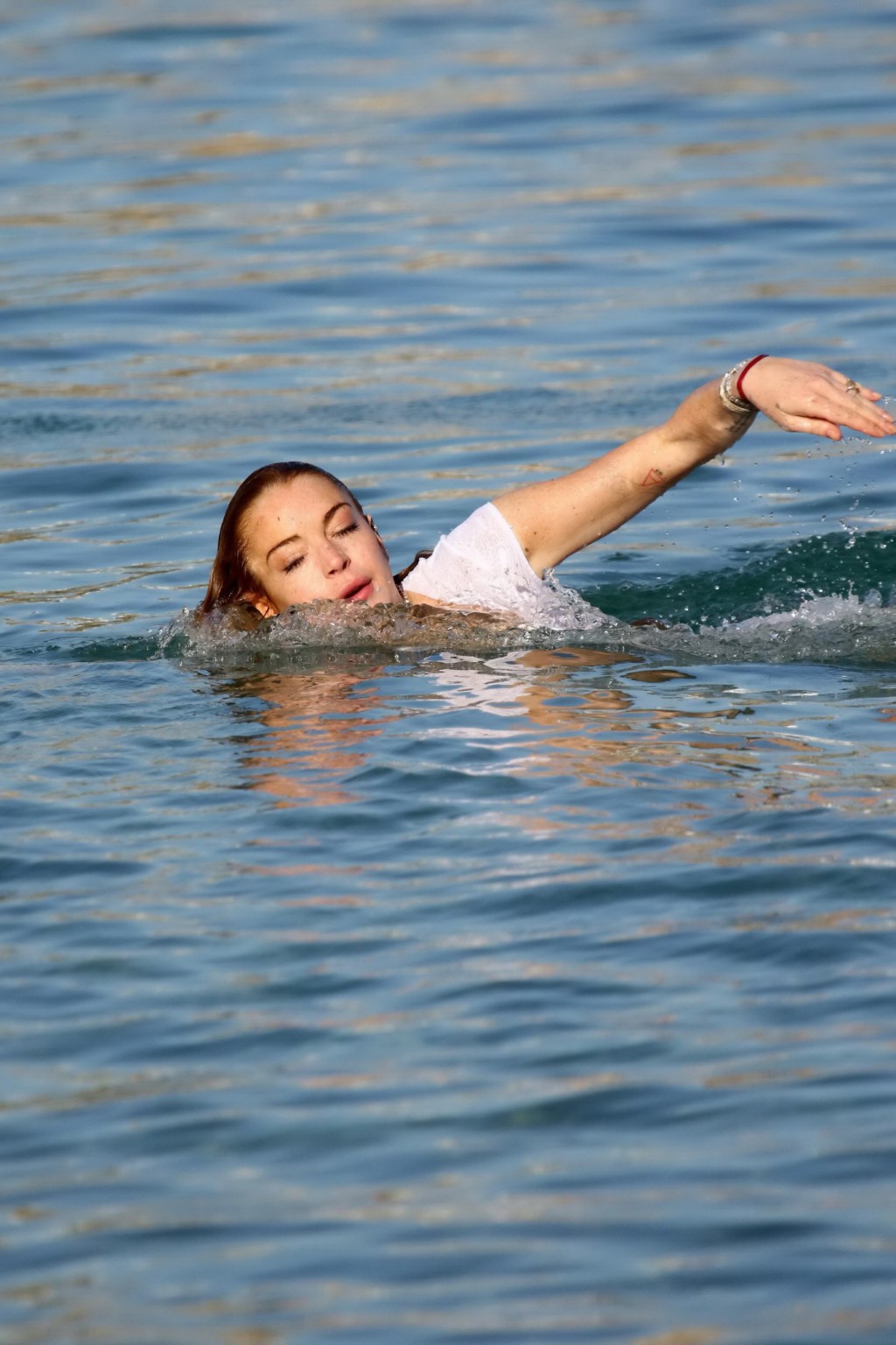 Lindsay Lohan busty in bizarre white seethrough swimsuit #75157809