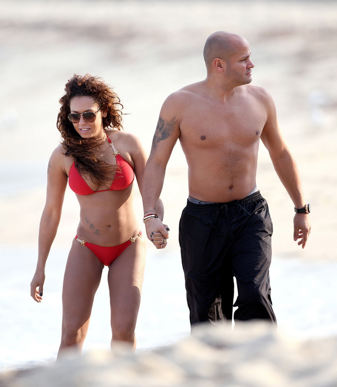 Melanie Brown wearing skimpy red bikini at Bronte Beach in Sydney #75215004